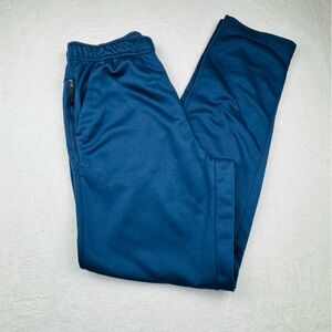 Nike Therma-FIT pants in navy, men’s size tall M. Side zip pocket.
